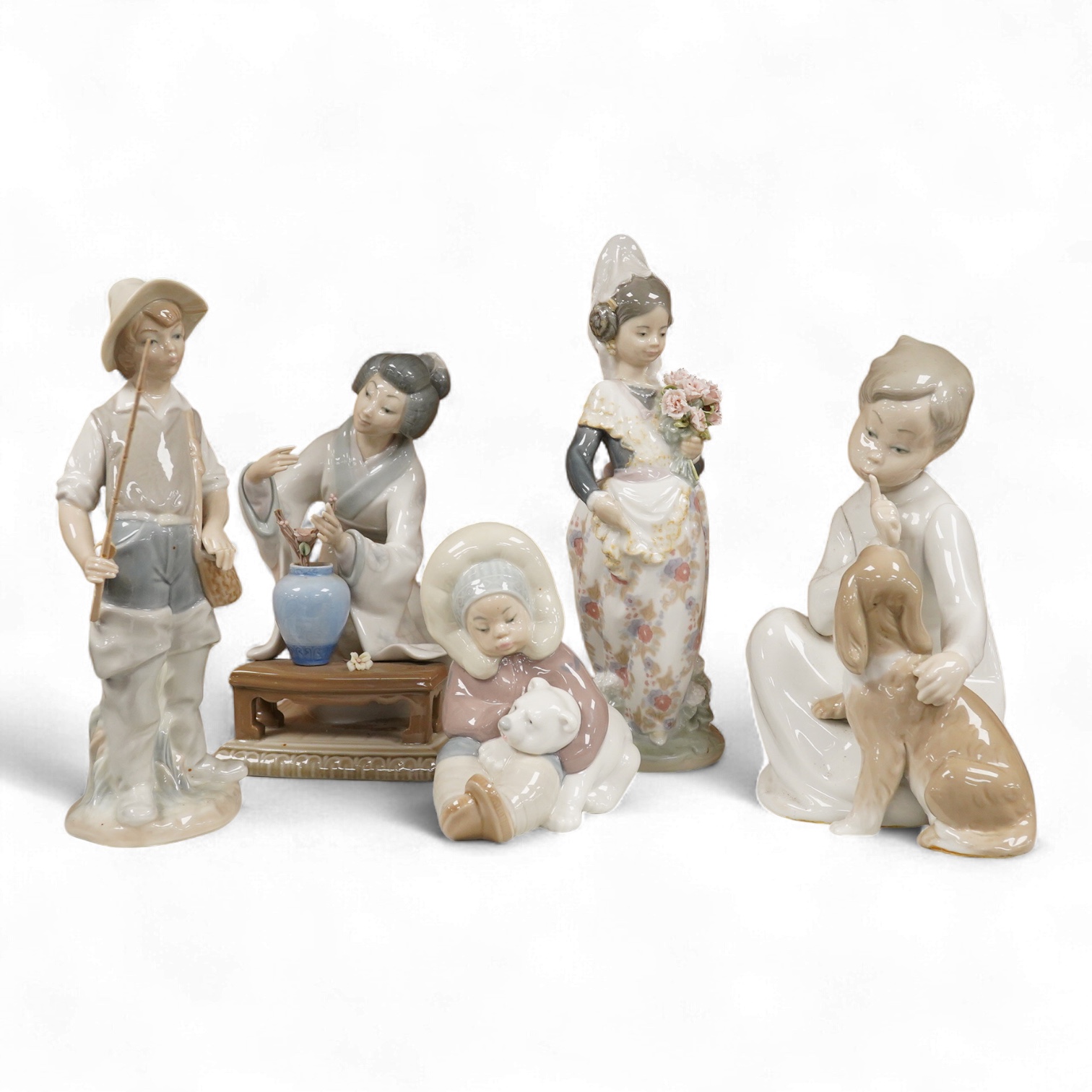 A collection of five Lladro figures, largest 24cm high